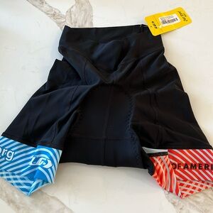 Women’s Louis Garneaux new semi custom black bike shorts -red and blue leg cuff